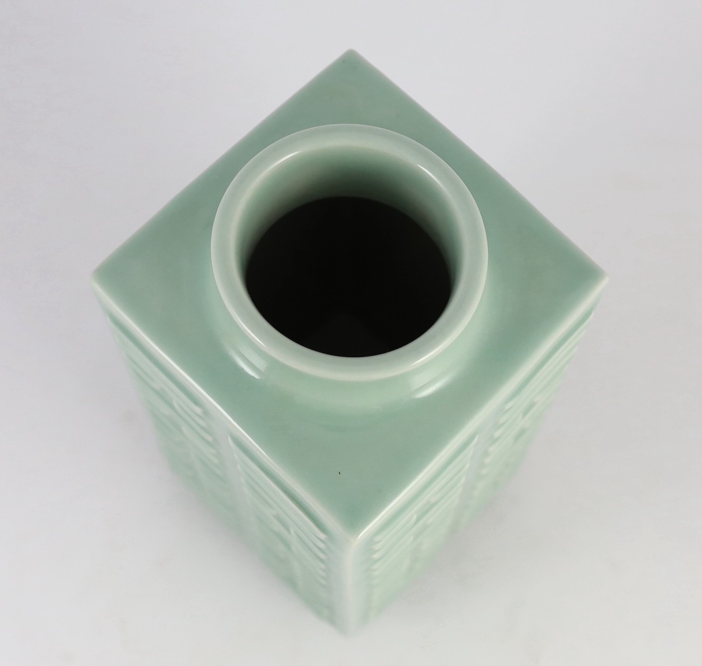 A Chinese celadon glazed ‘eight trigrams’ square vase, cong, Guangxu six character mark probably later, 30cm high